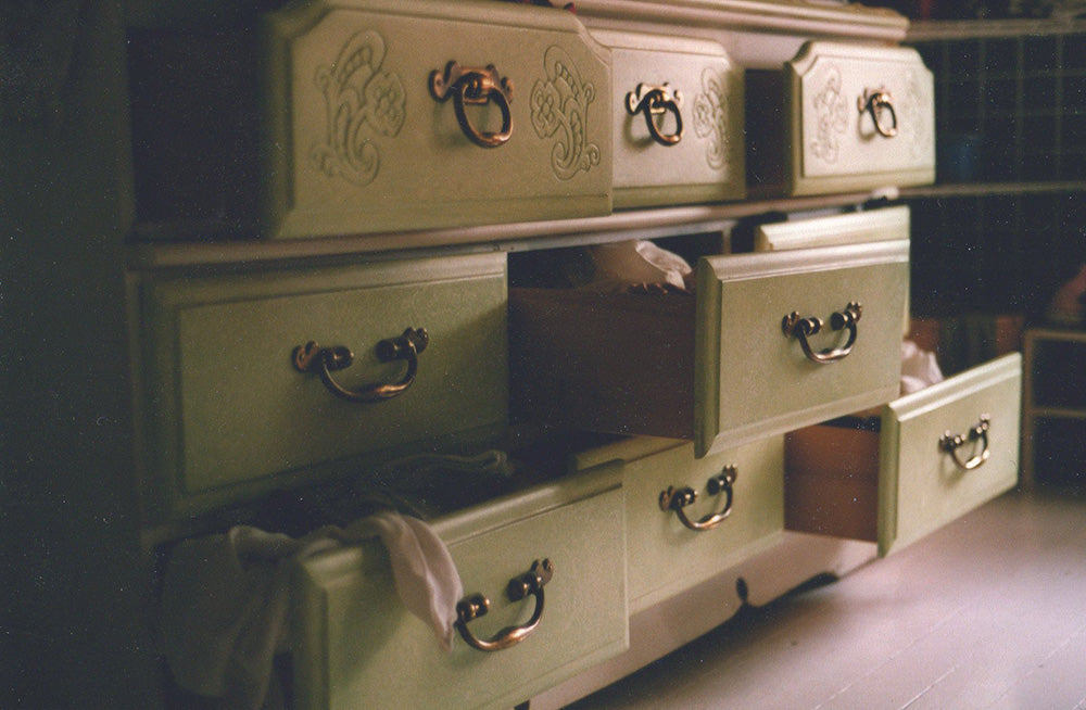 dresser with drawers half open